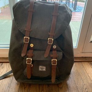 Pre-loved green Herschel computer backpack